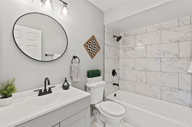 full bathroom with toilet, tiled shower / bath combo, and vanity