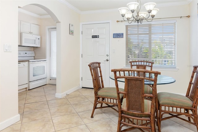 tiled dining room featuring ornamental molding and a notable chandelier