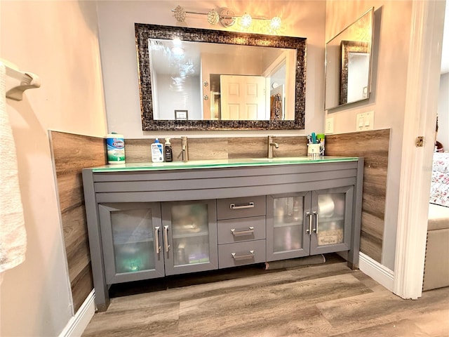 bathroom featuring vanity and hardwood / wood-style floors