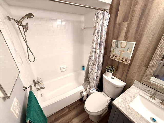 full bathroom with wood-type flooring, toilet, vanity, and shower / bath combination with curtain