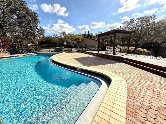 view of swimming pool with a gazebo