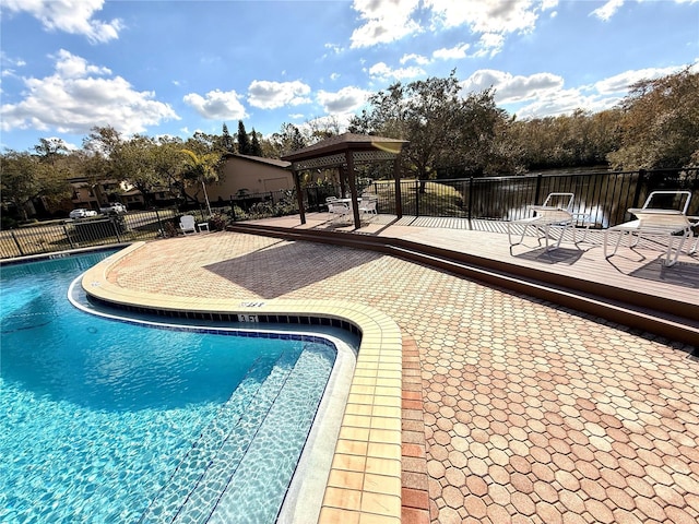 view of swimming pool with a gazebo