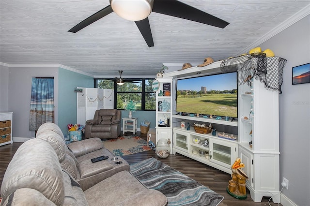 living room with ornamental molding, dark hardwood / wood-style floors, and ceiling fan