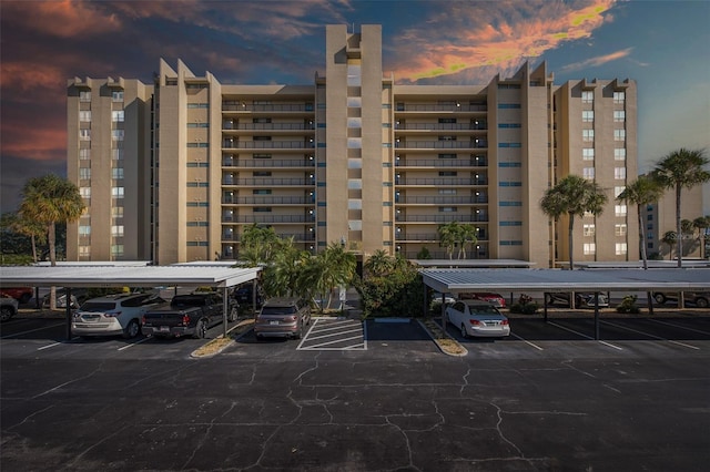 view of outdoor building at dusk