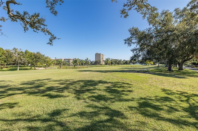 surrounding community with a yard