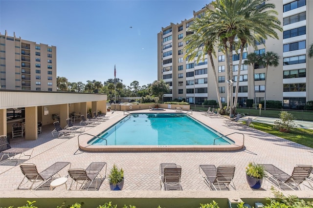 view of swimming pool with a patio area