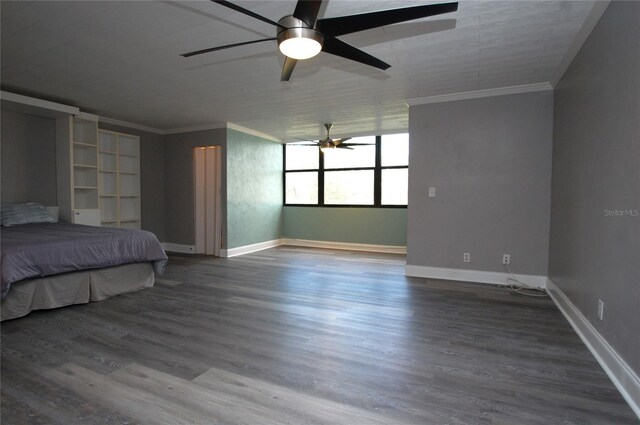 unfurnished bedroom featuring crown molding, hardwood / wood-style floors, and ceiling fan