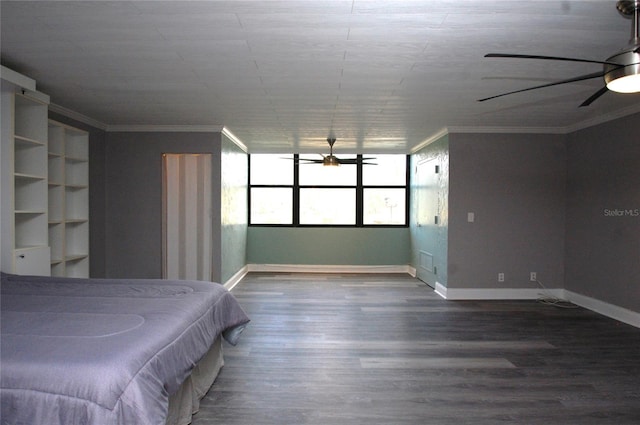 unfurnished bedroom featuring ornamental molding, wood-type flooring, and ceiling fan