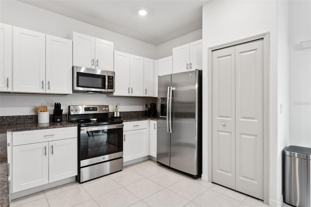 kitchen featuring white cabinets and stainless steel appliances