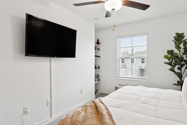 bedroom featuring ceiling fan