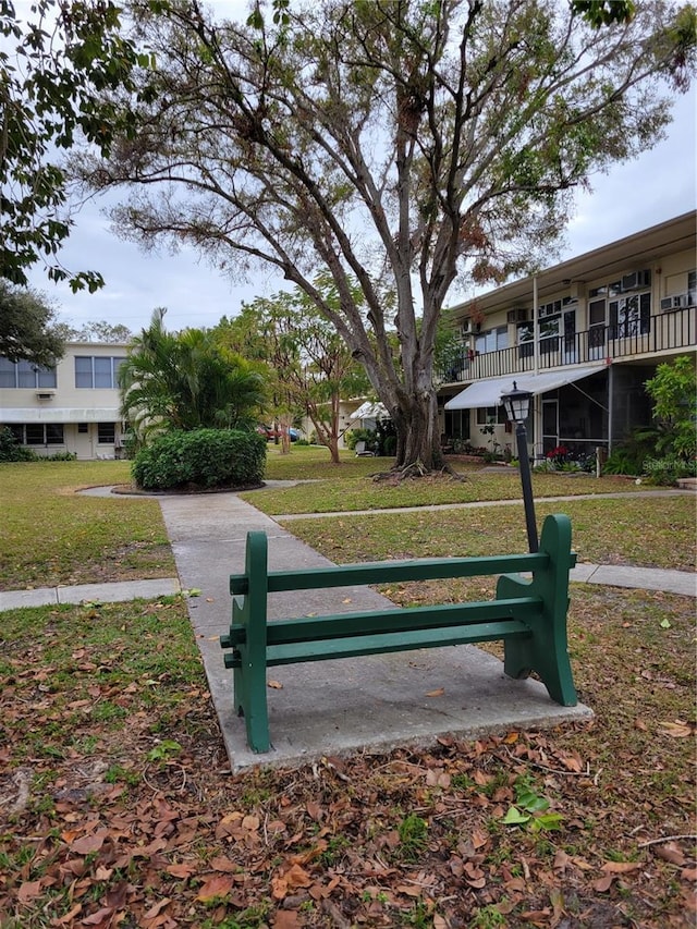 view of home's community featuring a yard