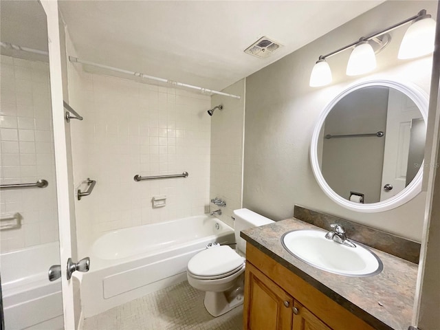 full bathroom with toilet, tiled shower / bath combo, tile patterned floors, and vanity