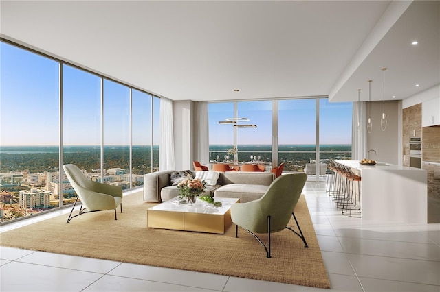 tiled living room with expansive windows and sink