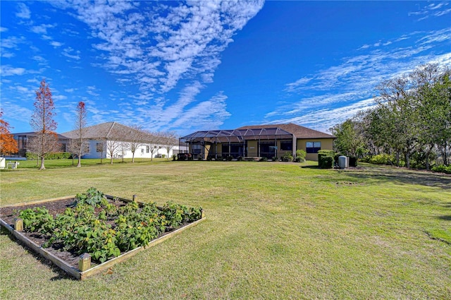 view of yard featuring a lanai