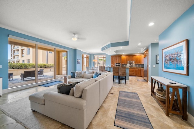 living room featuring a textured ceiling