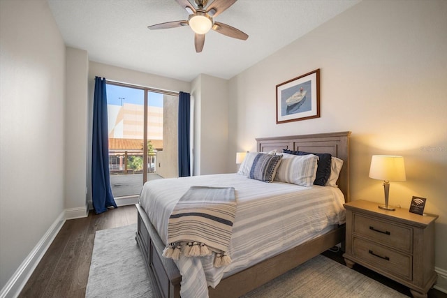 bedroom with access to outside, ceiling fan, and dark hardwood / wood-style floors