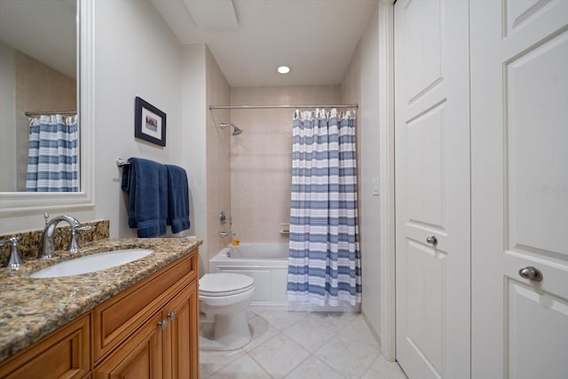 full bathroom featuring tile patterned floors, toilet, vanity, and shower / bath combo