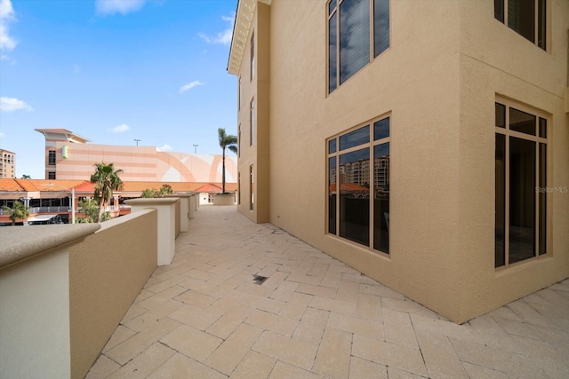 view of patio with a balcony