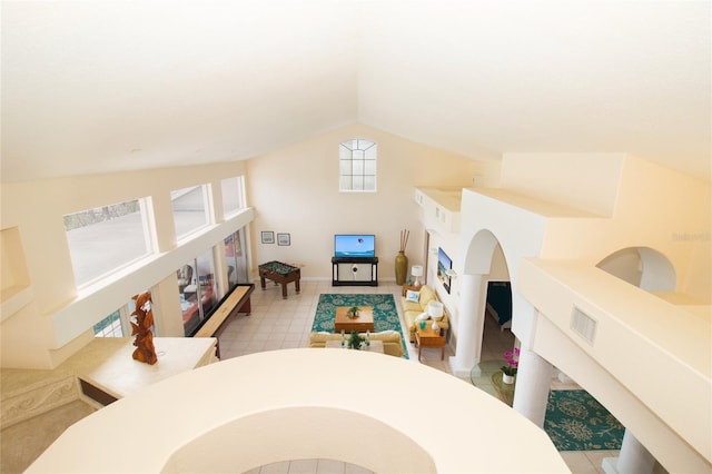 playroom featuring vaulted ceiling