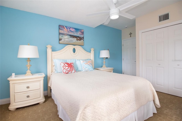 carpeted bedroom with ceiling fan and a closet