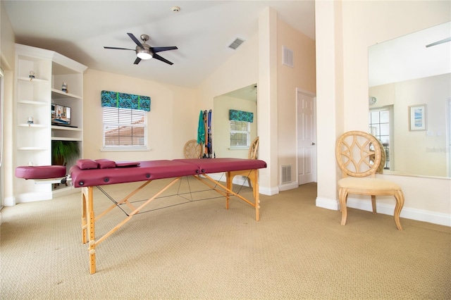 rec room featuring vaulted ceiling, ceiling fan, and carpet floors