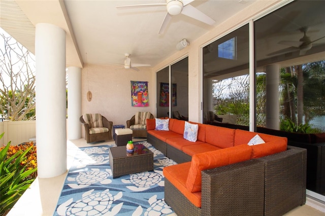 view of patio / terrace with an outdoor living space and ceiling fan