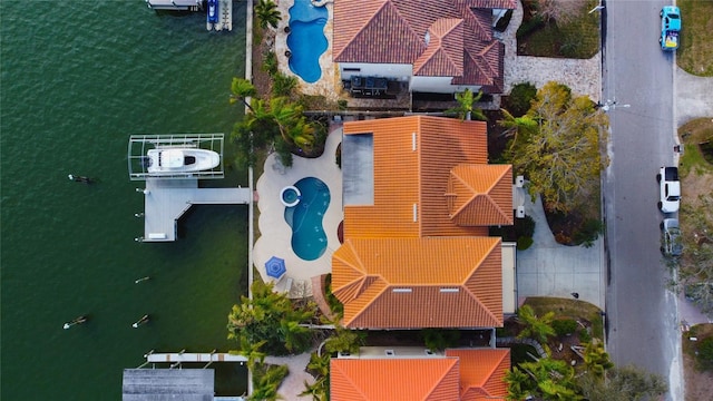 drone / aerial view featuring a water view