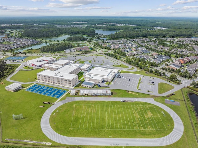 birds eye view of property featuring a water view