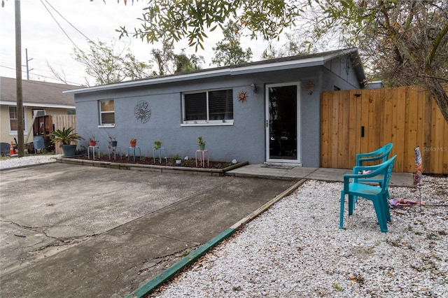 ranch-style house with a patio