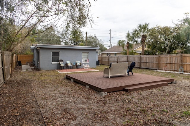 rear view of property with a deck