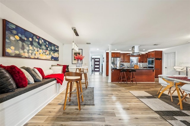 living room featuring light wood-type flooring