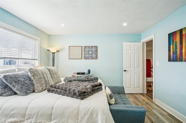 bedroom featuring light wood-type flooring