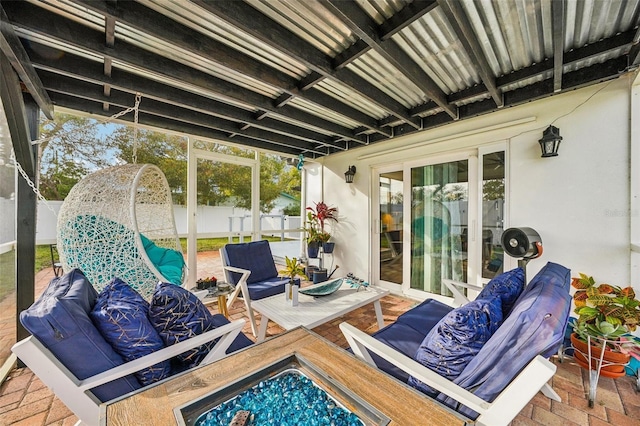 sunroom / solarium with a hot tub