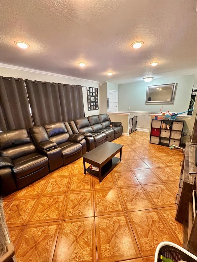 living room with light tile patterned floors, a decorative wall, recessed lighting, and a textured ceiling