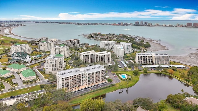 drone / aerial view with a view of city and a water view