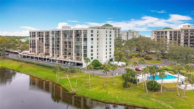 view of building exterior featuring a water view