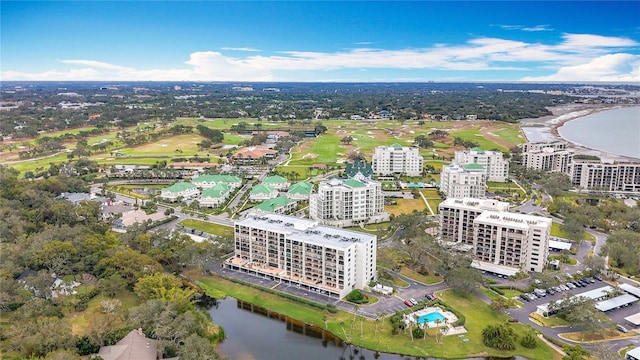 aerial view featuring a view of city and a water view