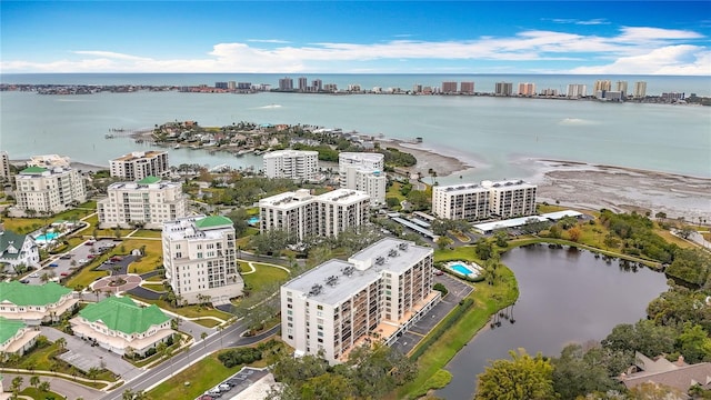 bird's eye view featuring a water view and a city view