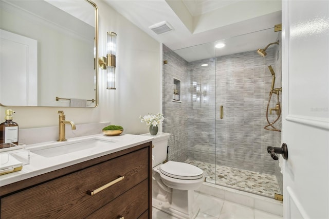 bathroom featuring tile patterned floors, a shower with door, vanity, toilet, and crown molding