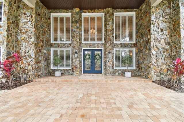 doorway to property featuring french doors