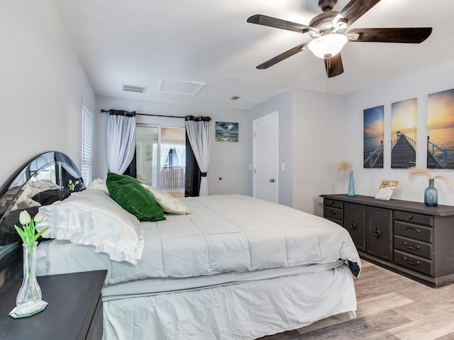 bedroom with light hardwood / wood-style floors and ceiling fan