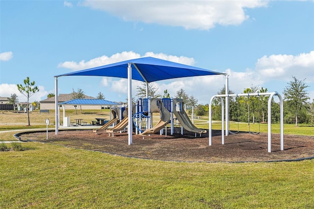 view of play area featuring a lawn