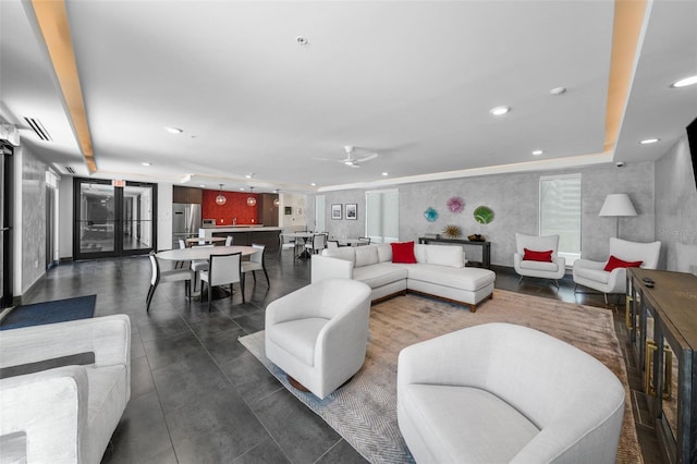 living room with ceiling fan