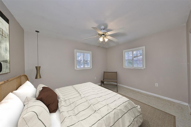 bedroom featuring ceiling fan