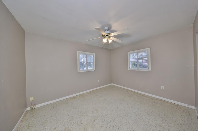 spare room featuring ceiling fan