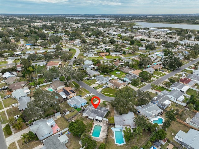 bird's eye view with a water view