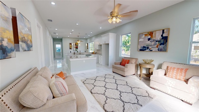 living room featuring ceiling fan