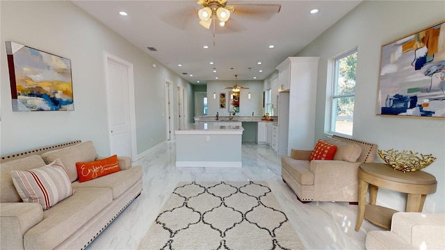 living room featuring ceiling fan