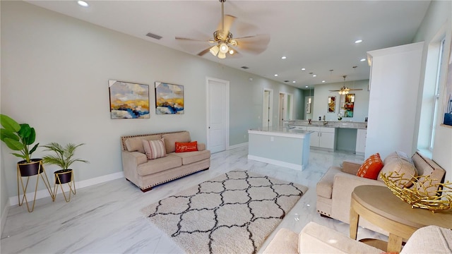 living room with ceiling fan