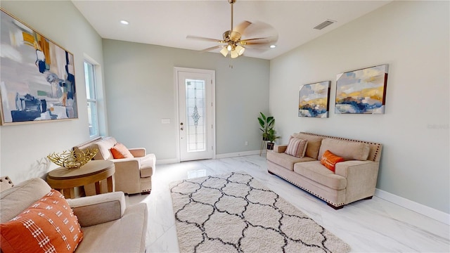 living room featuring ceiling fan